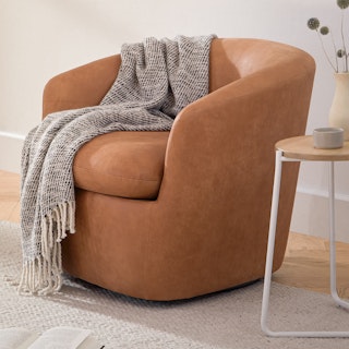 Turoy Rawhide Tan Swivel Chair